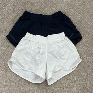 Navy and white Lululemon Hotty Hot 4 inch shorts